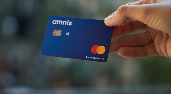 how to get a business debit card – amnis business debit Mastercard held in hand